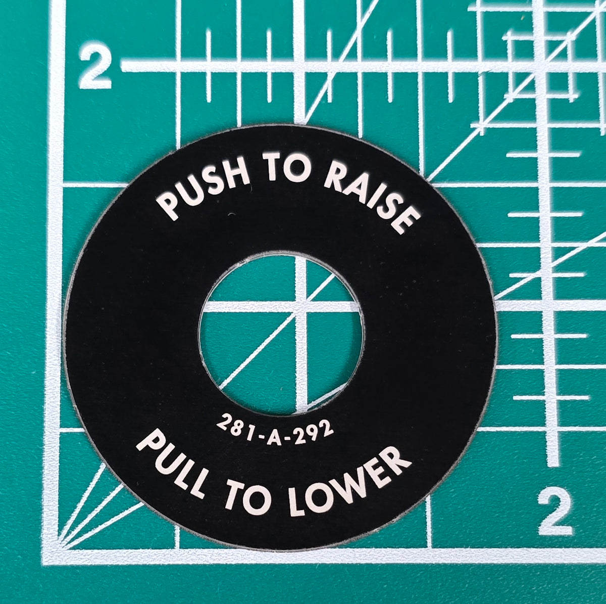 Kenworth Push to Raise Pull to Lower Switch Plate 281-A-292